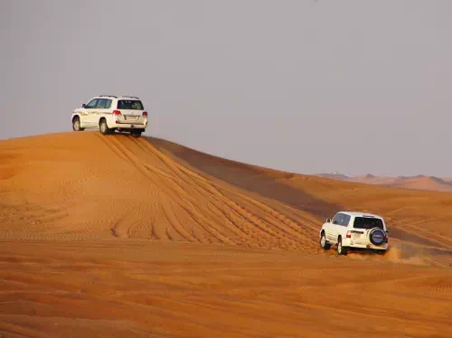 Overnight Desert Camping Adventure with Camel Ride Experience from Dubai
