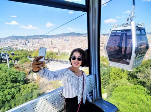 Montserrat Hiking & Barcelona E-Bike Tour with Montjuic Cable Car and Boat Ride