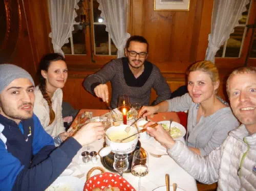 Interlaken Snowshoe Tour and Sledding in Swiss Alps with Cheese Fondue Lunch